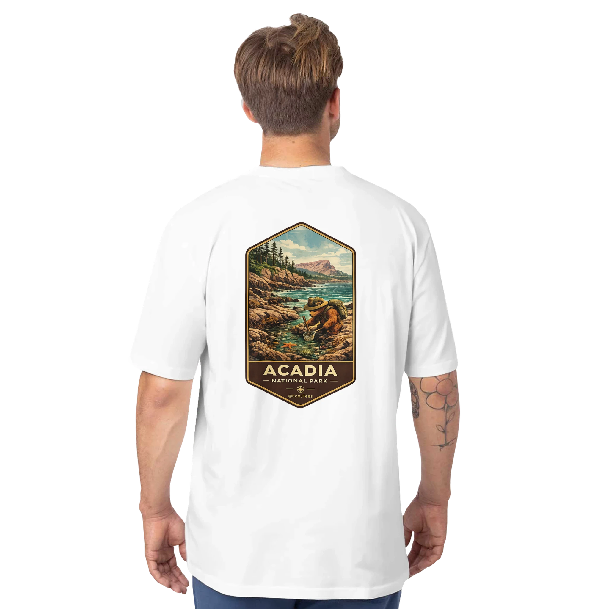 Person wearing a white t-shirt with a scenic graphic and 'Acadia National Park' text on the back.