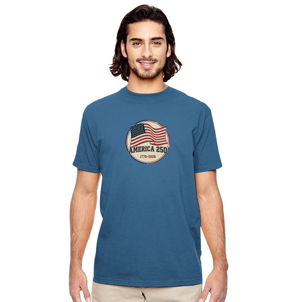 Man wearing a blue t-shirt with an American flag design on a white background