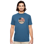 Man wearing a blue t-shirt with an American flag design on a white background