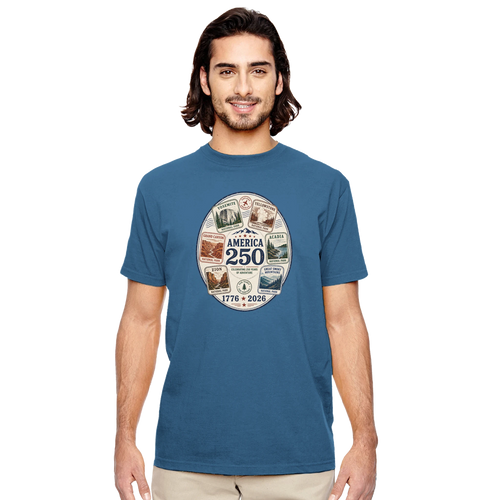 Man wearing a blue t-shirt with a circular graphic design on a white background