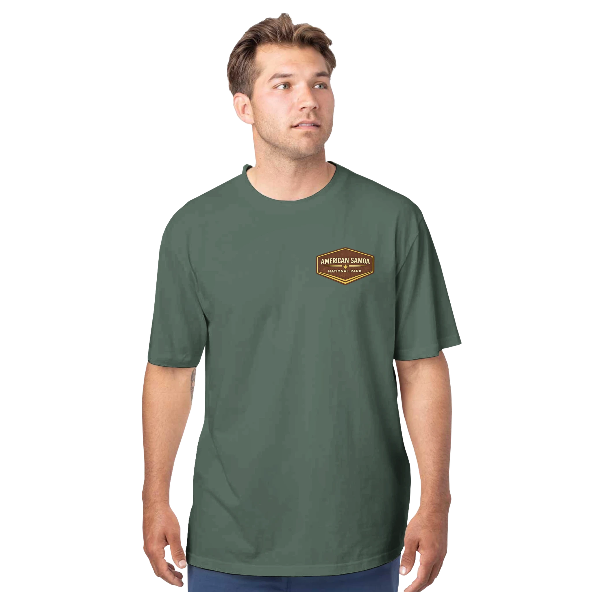 Man wearing a green t-shirt with a logo on a white background
