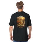 Person wearing a black t-shirt with Badlands National Park graphic on the back