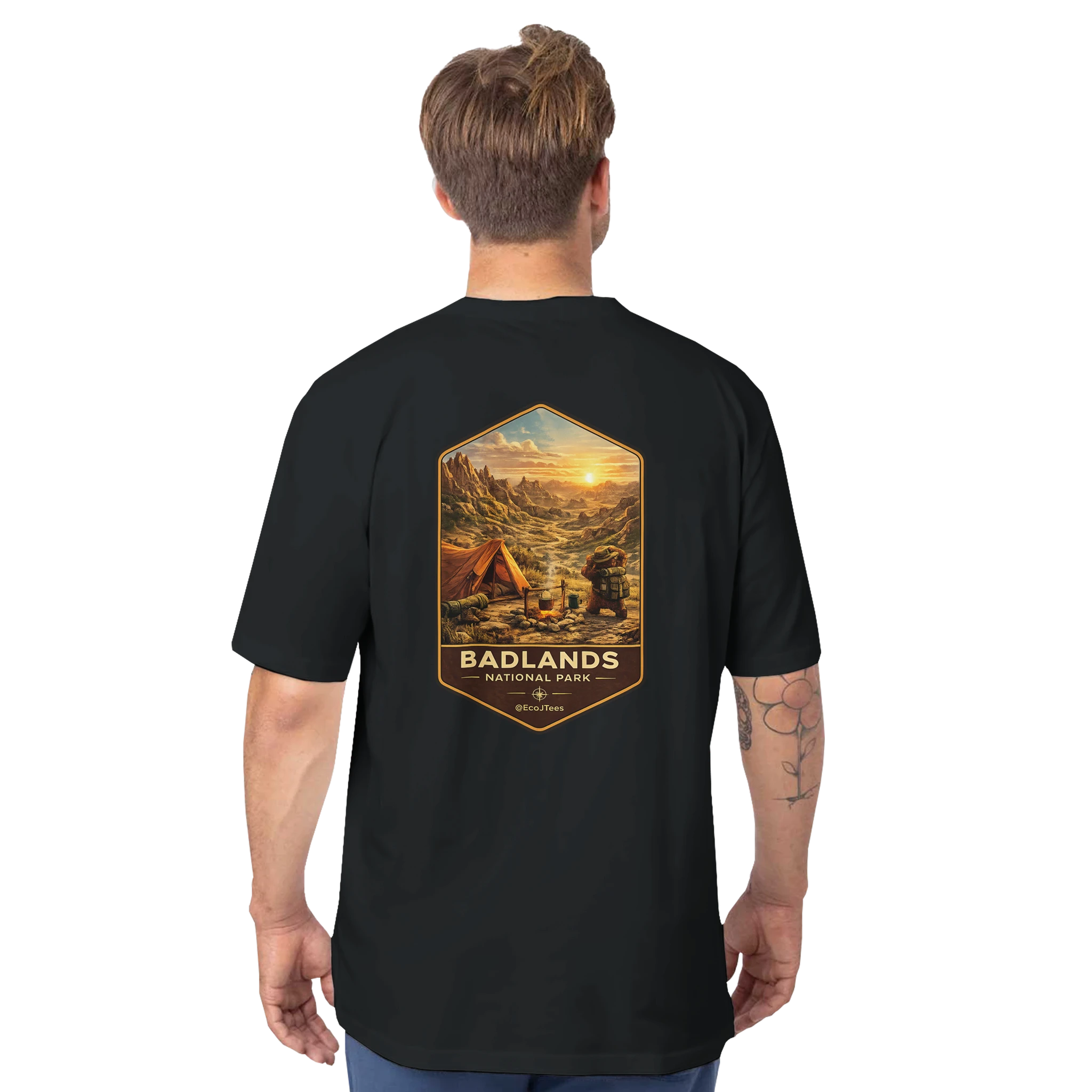 Person wearing a black t-shirt with Badlands National Park graphic on the back