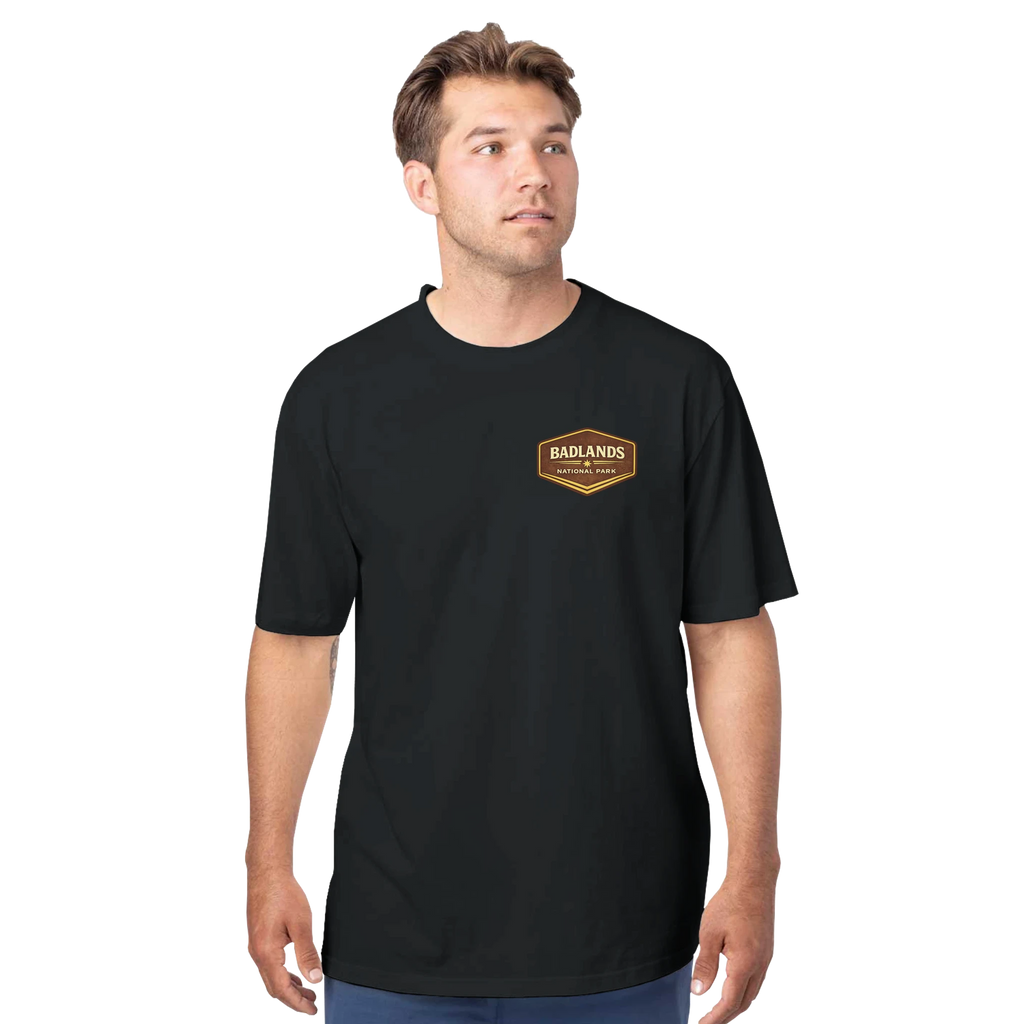 Man wearing a black t-shirt with a logo on a white background