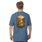 Man wearing a blue t-shirt with Big Bend National Park graphic on the back