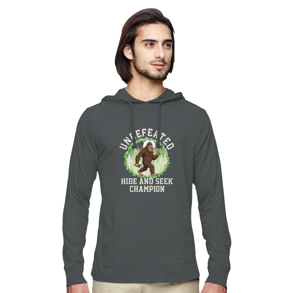 Man wearing a dark gray Bigfoot eco hoodie with a graphic design on a white background