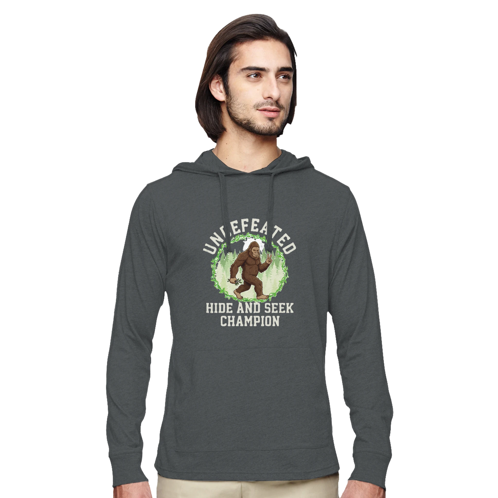 Man wearing a dark gray Bigfoot eco hoodie with a graphic design on a white background