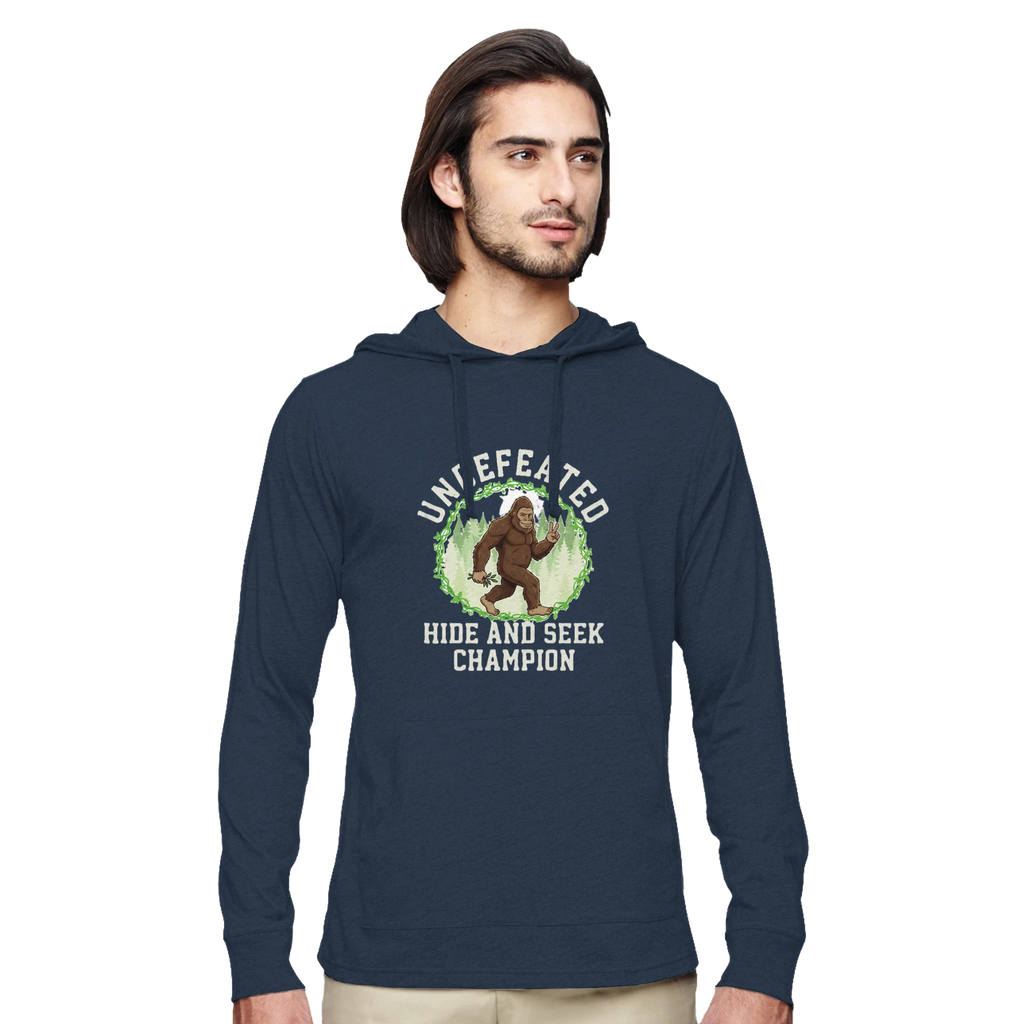 Man wearing a navy blue hoodie with a graphic design on a white background