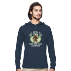 Man wearing a navy blue hoodie with a graphic design on a white background