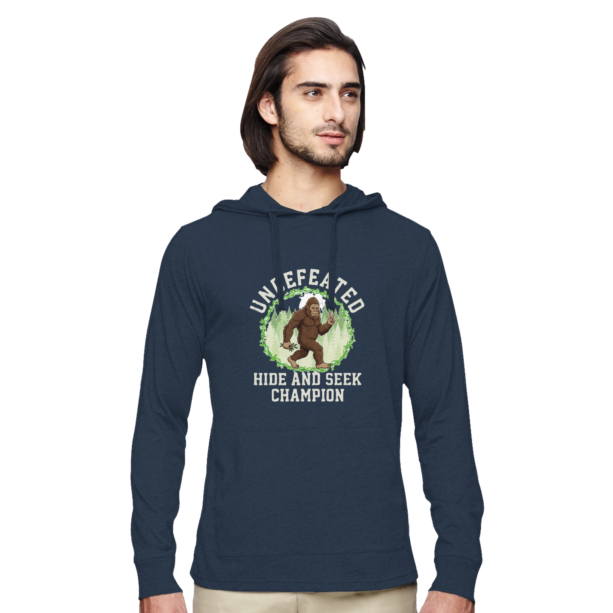 Man wearing a navy blue hoodie with a graphic design on a white background