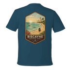 Teal t-shirt with Biscayne National Park graphic on a white background
