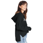 Person wearing a black hoodie with Camper Queen text and graphic on a white background