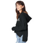 Side view of person wearing a black hoodie with Camper Queen text and graphic against a white background