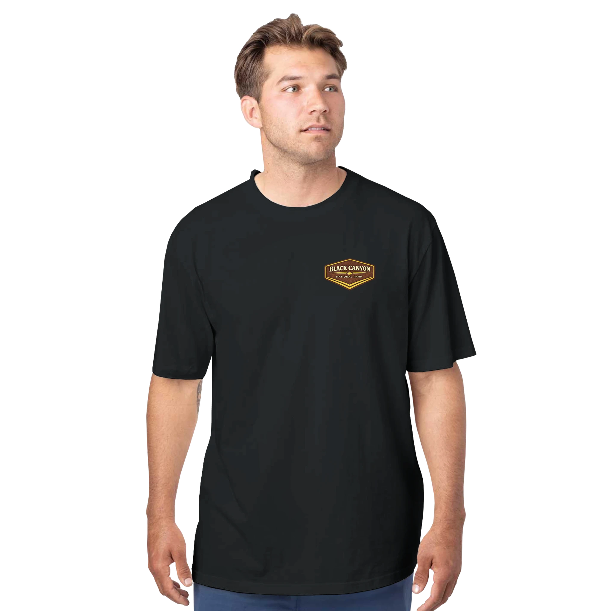 Man wearing a black t-shirt with a logo on a white background