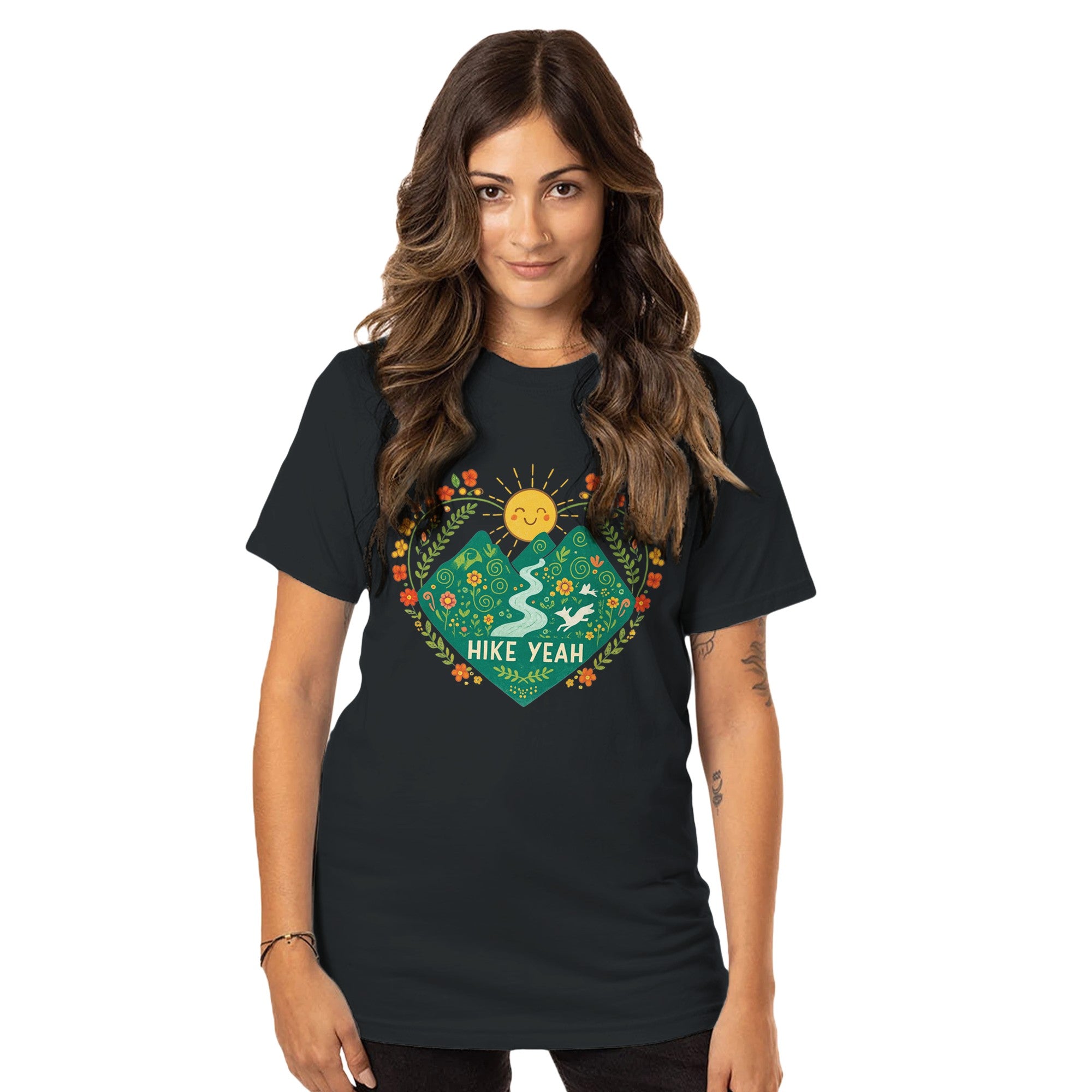 Woman wearing a black t-shirt with a colorful graphic design on a white background