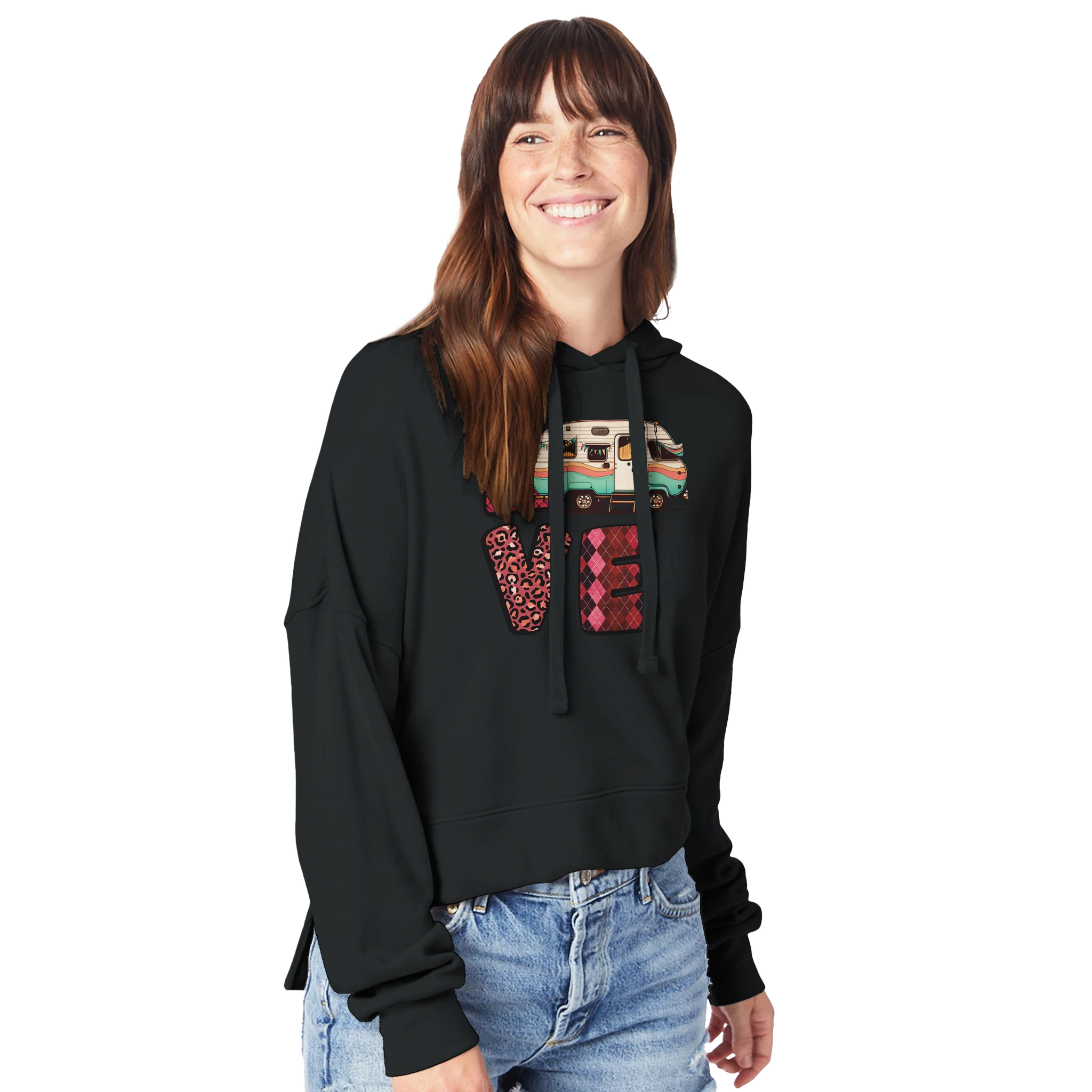 Woman wearing a black hoodie from the Love Collection with colorful patterns on a white background