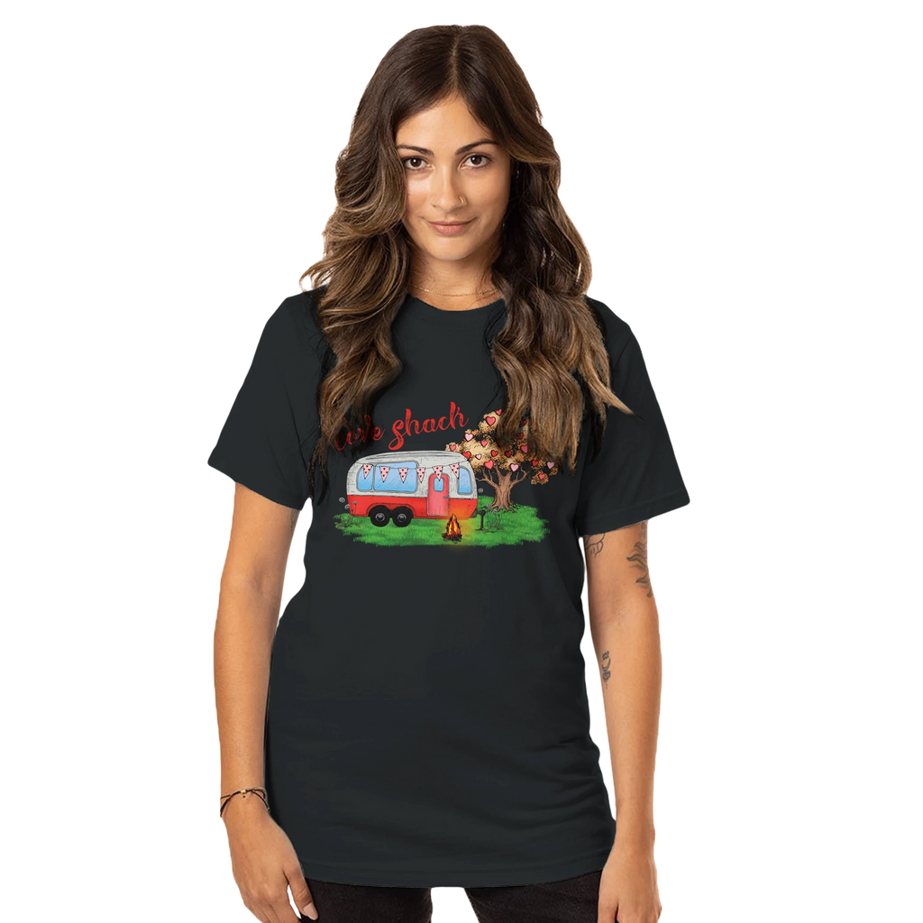 Woman wearing a black t-shirt from the Love Collection with a graphic design of a trailer and text.