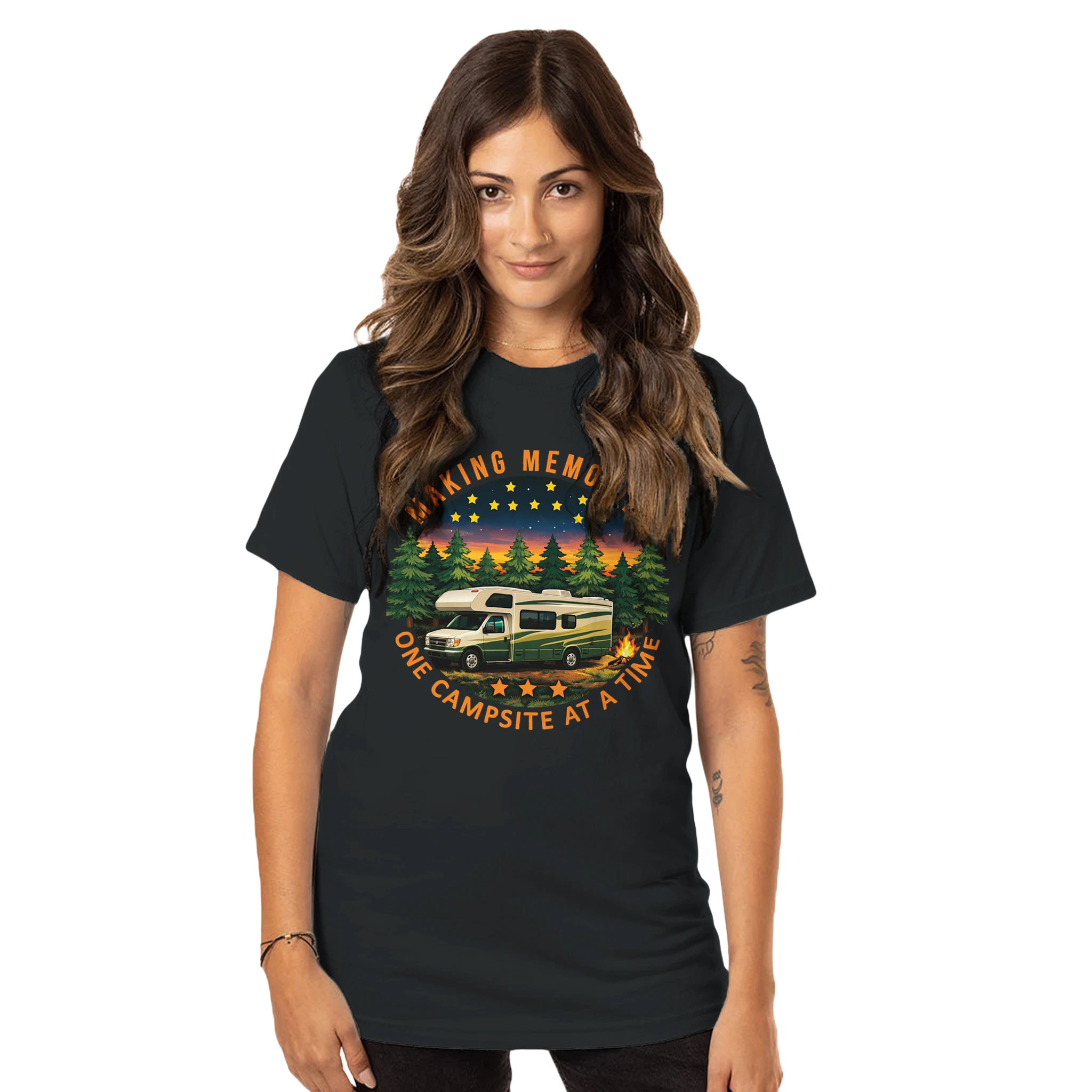 Woman wearing a black t-shirt with a graphic design of a camper van and nature scene.