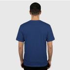 Back of a person wearing a blue t-shirt