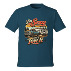 Blue t-shirt with graphic design of a truck and camper and text 'I'm Sexy and I Tow It' on a white background