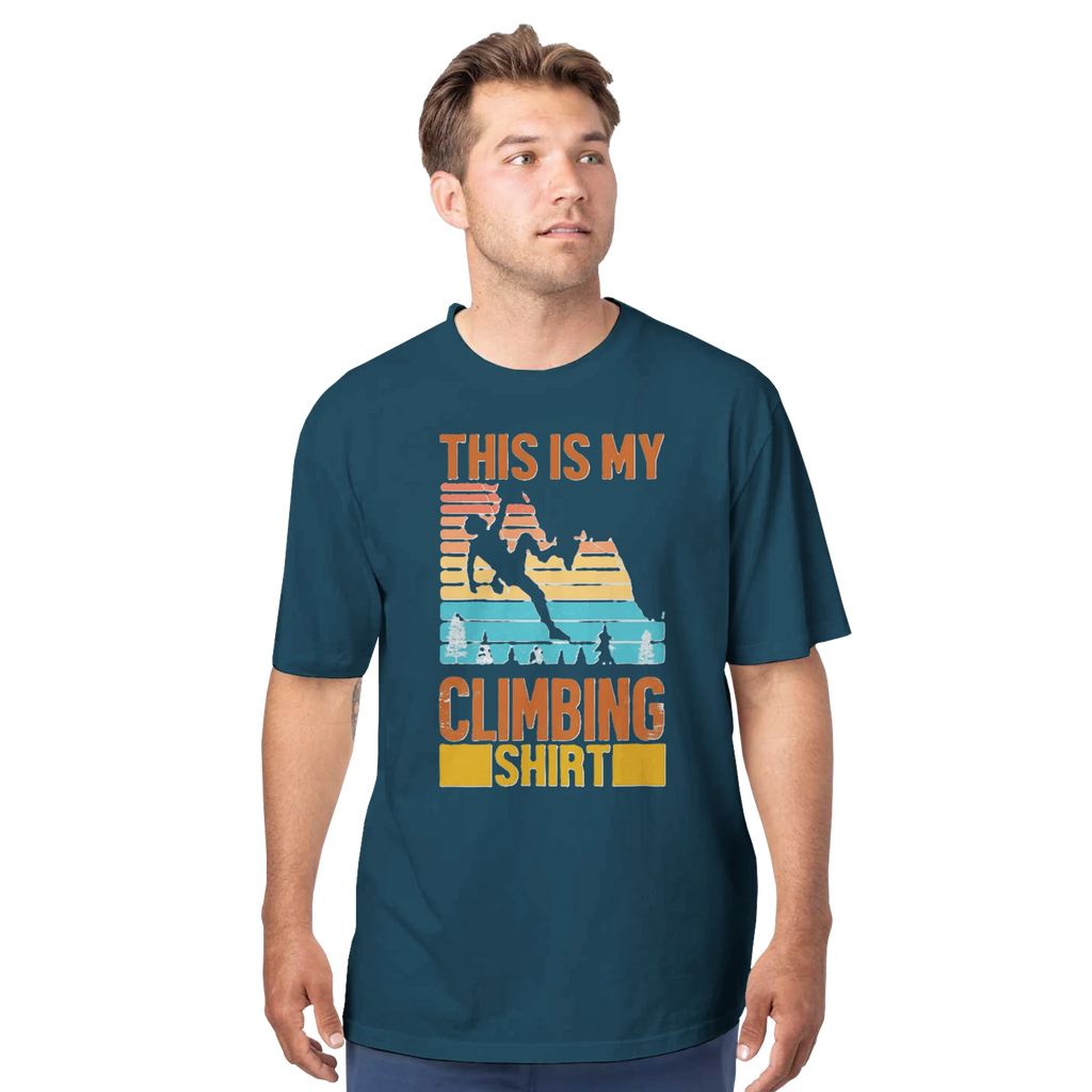 Man wearing a blue t-shirt with a climbing graphic and text on a white background