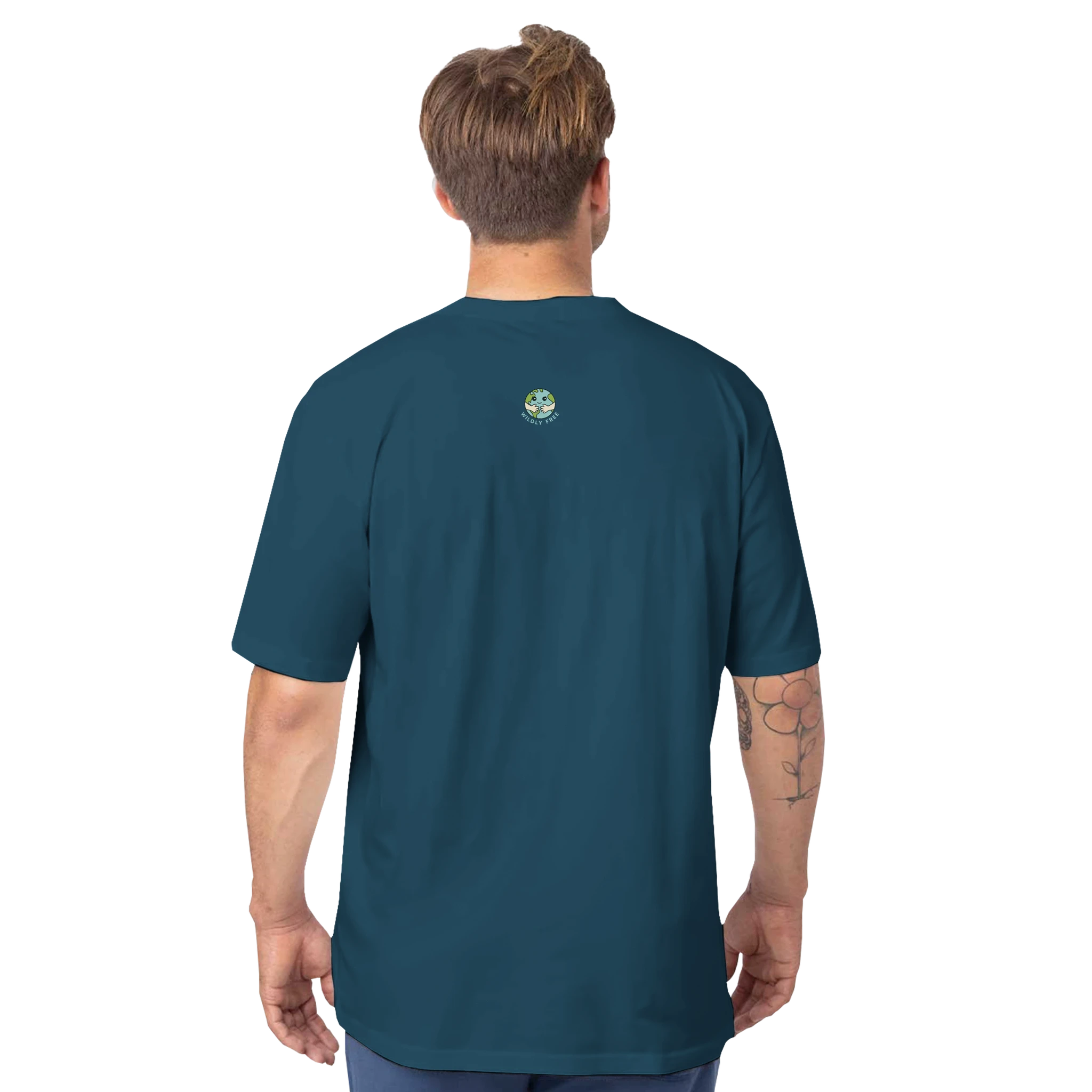 Man wearing a teal t-shirt with a logo on the back against a white background