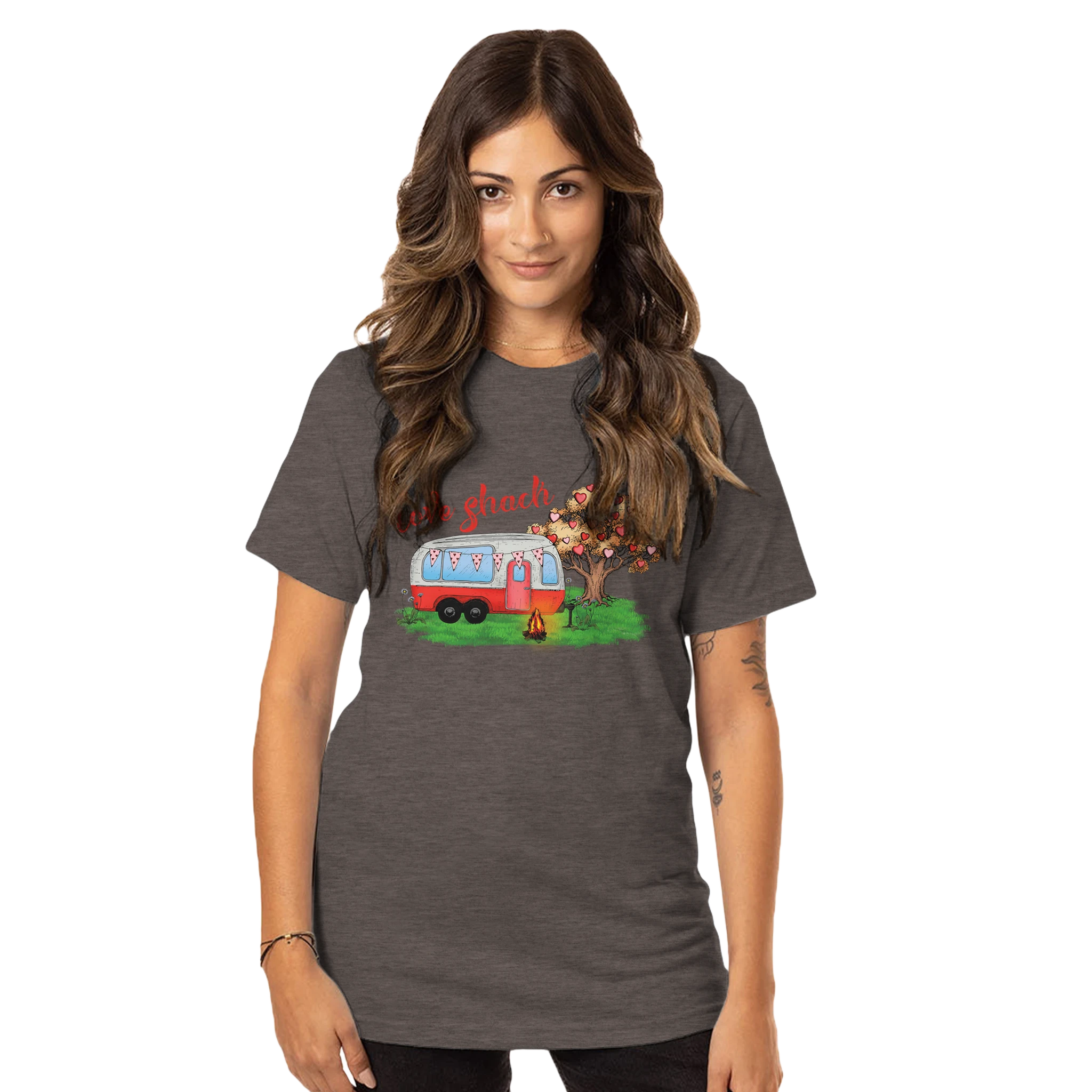 Woman wearing a brown t-shirt from the Love Collection with a graphic design on a white background