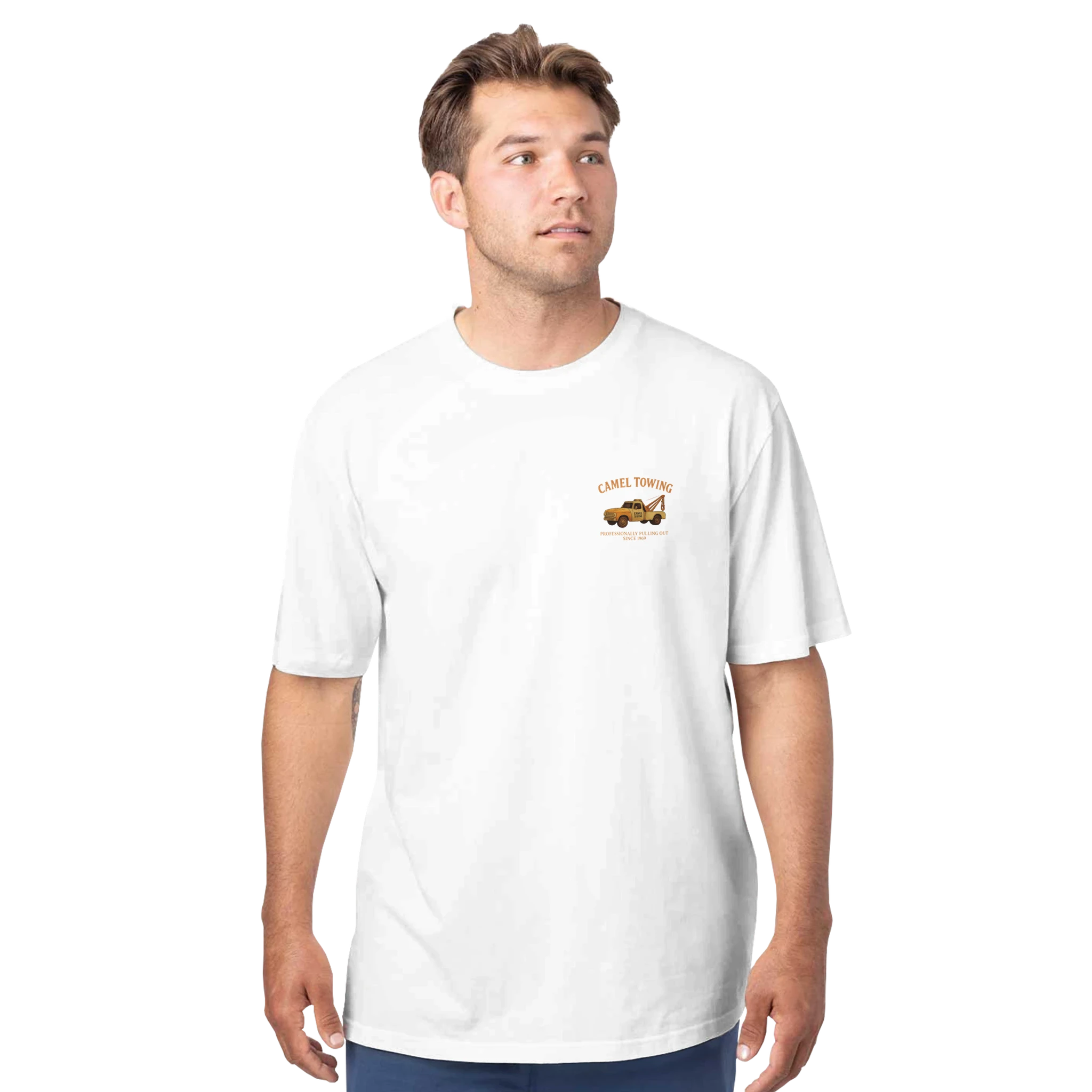 Man wearing a white t-shirt with a small Camel Towing graphic on a white background