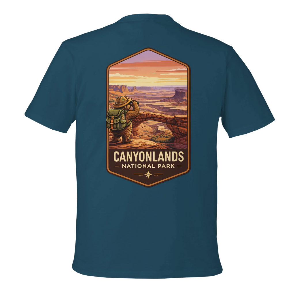 Teal t-shirt with Canyonlands National Park graphic on a white background