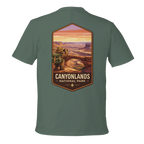 Green t-shirt with Canyonlands National Park graphic on a white background