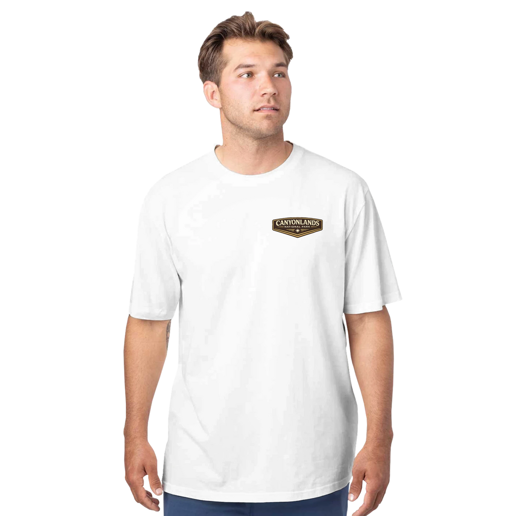 Man wearing a white t-shirt with a logo on a white background