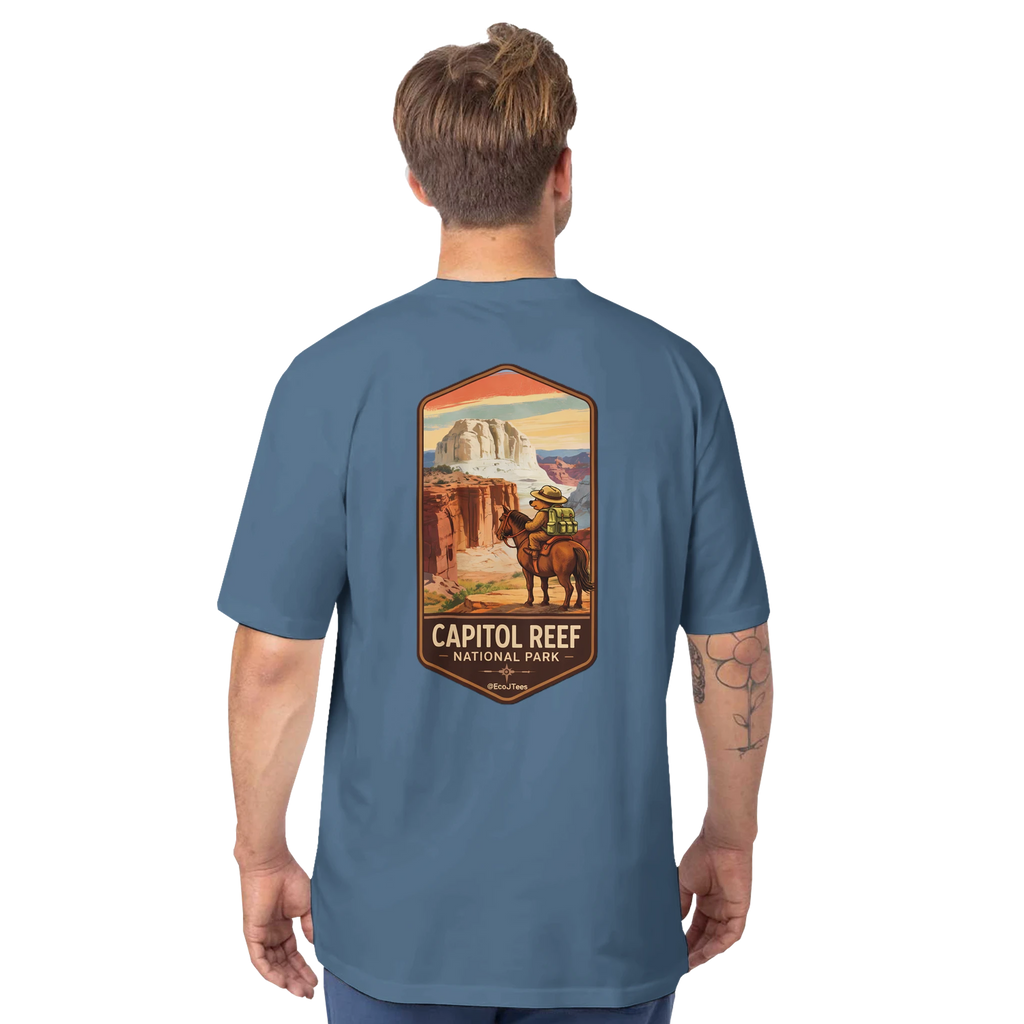 Man wearing a blue t-shirt with Capitol Reef National Park graphic on the back