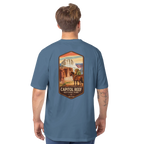 Man wearing a blue t-shirt with Capitol Reef National Park graphic on the back