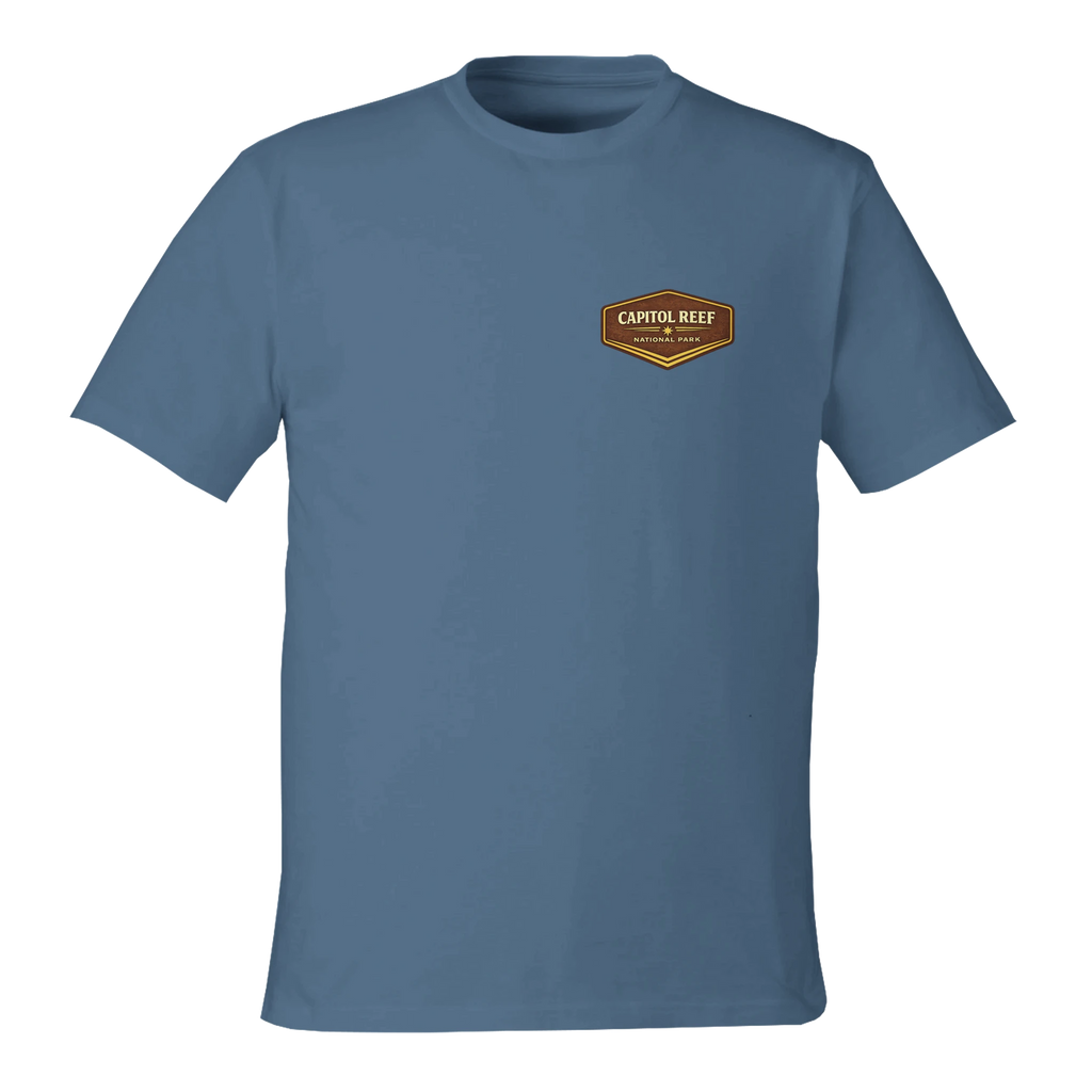 Blue t-shirt with a Capitol Reef National Park logo on a white background