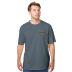 Man wearing a gray t-shirt with a Death Valley National Park logo on a white background