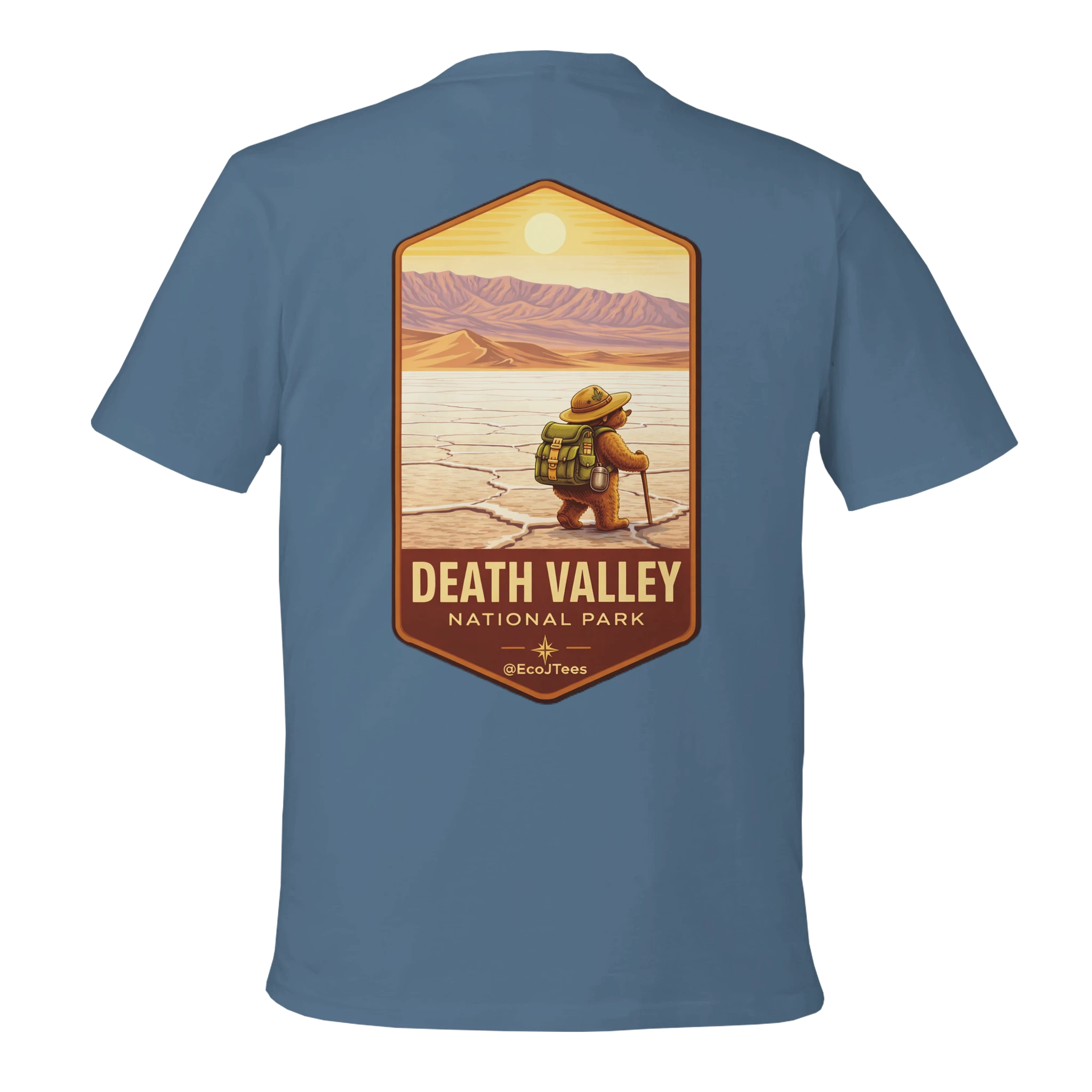 Blue t-shirt with a graphic of a person in a hat and backpack at Death Valley National Park on a white background
