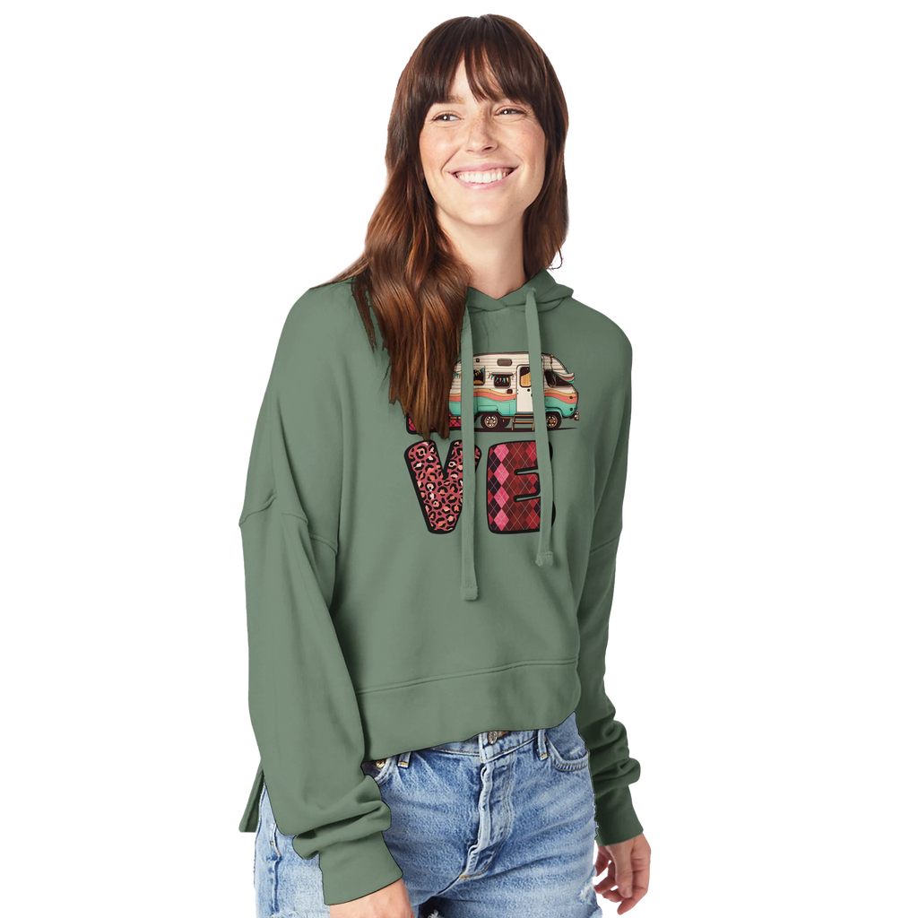 Person wearing a green hoodie with colorful 'LOVE' design from the Love Collection on a white background