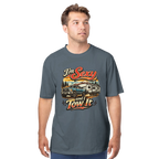 Man wearing a gray t-shirt with a I'm Sexy and I Tow It graphic design on a white background