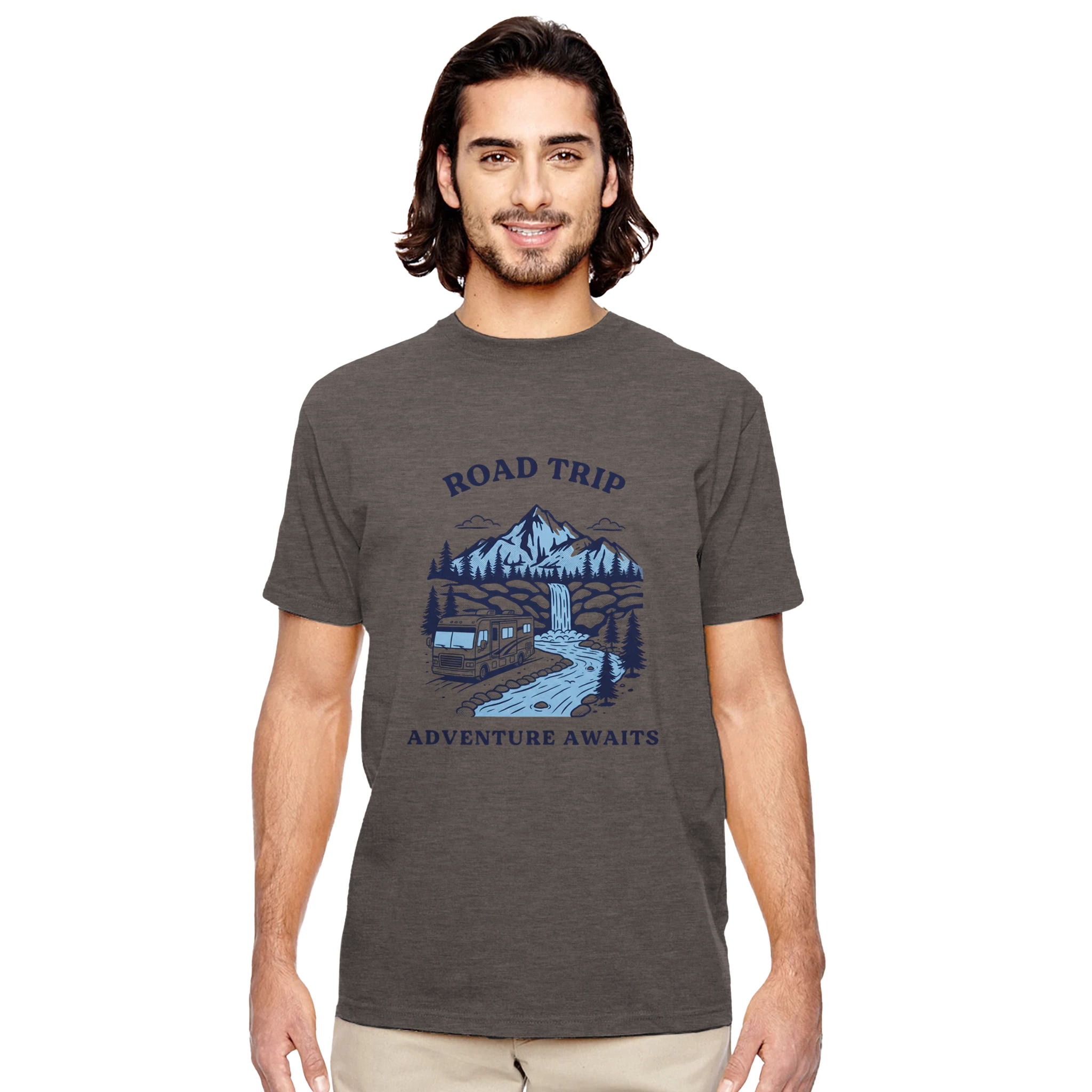 Man wearing a gray t-shirt with 'Road Trip Adventure Awaits' graphic design on a white background