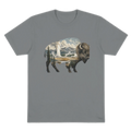 Bison silhouette filled with a Yellowstone-inspired geyser, evergreen forest, open wilderness, and mountain landscape printed on a grey organic cotton t-shirt