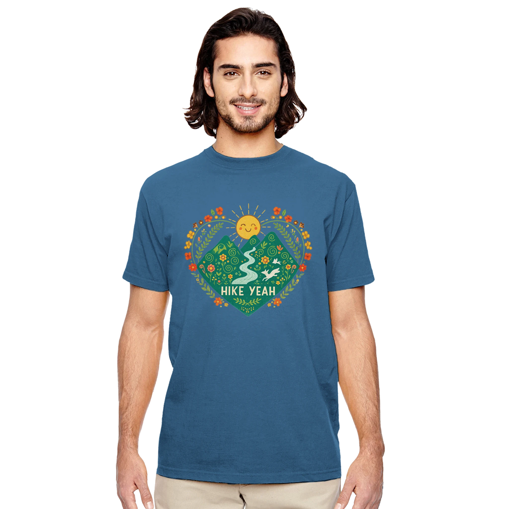 Man wearing a blue Hike Yeah t-shirt with a nature-themed graphic and 'Hike Yeah' text on a white background