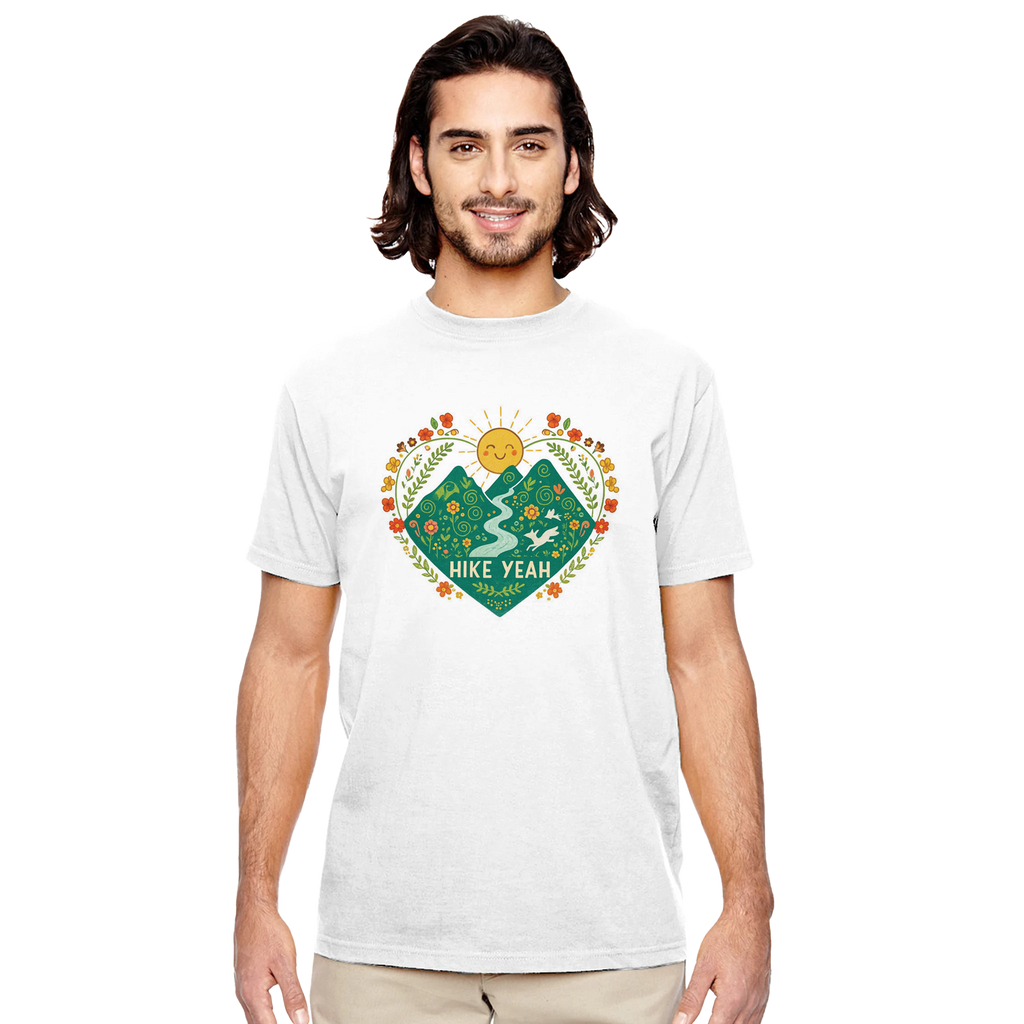 Man wearing a Hike Yeah white t-shirt with a nature-themed graphic design on a white background