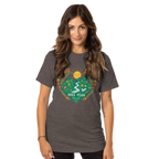 Woman wearing a dark gray t-shirt with a colorful graphic design on a white background