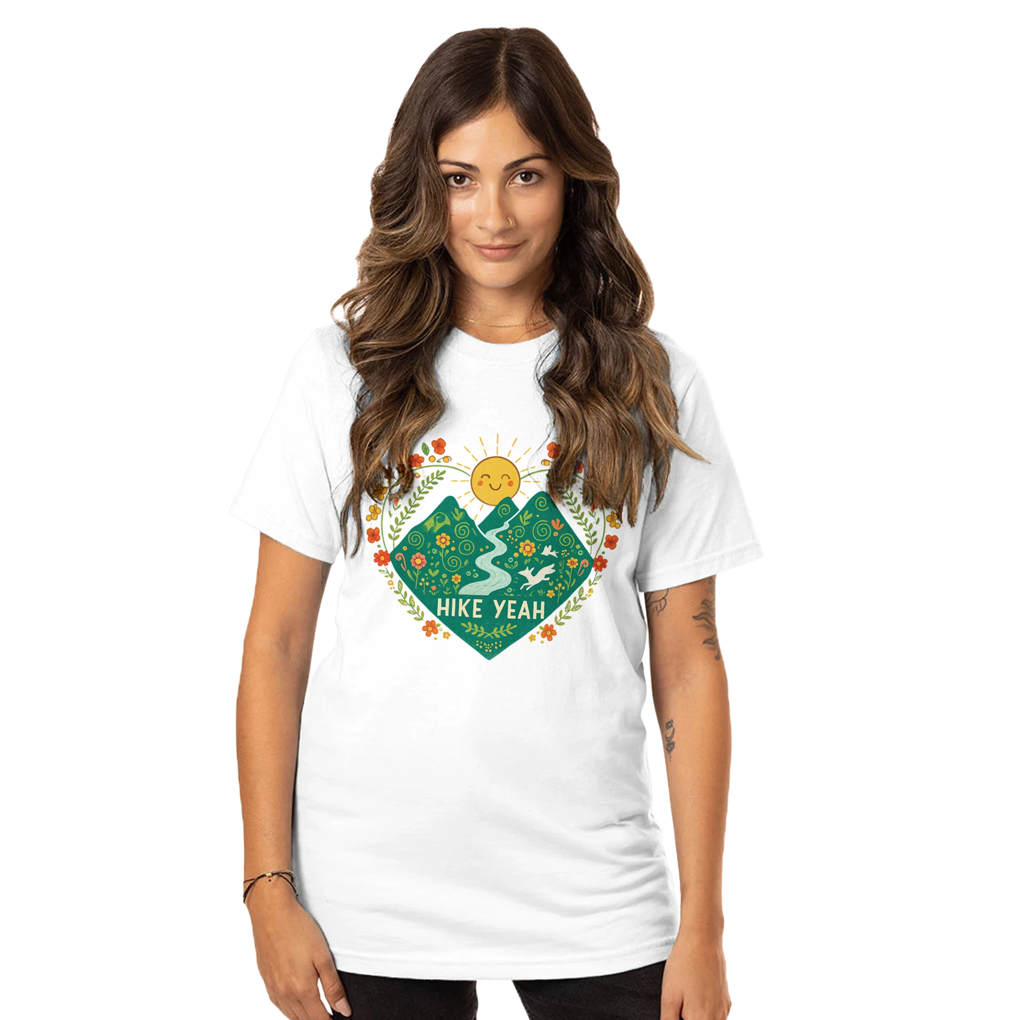 Woman wearing a white Hike Yeah t-shirt with a nature-themed design and 'Hike Yeah' text.