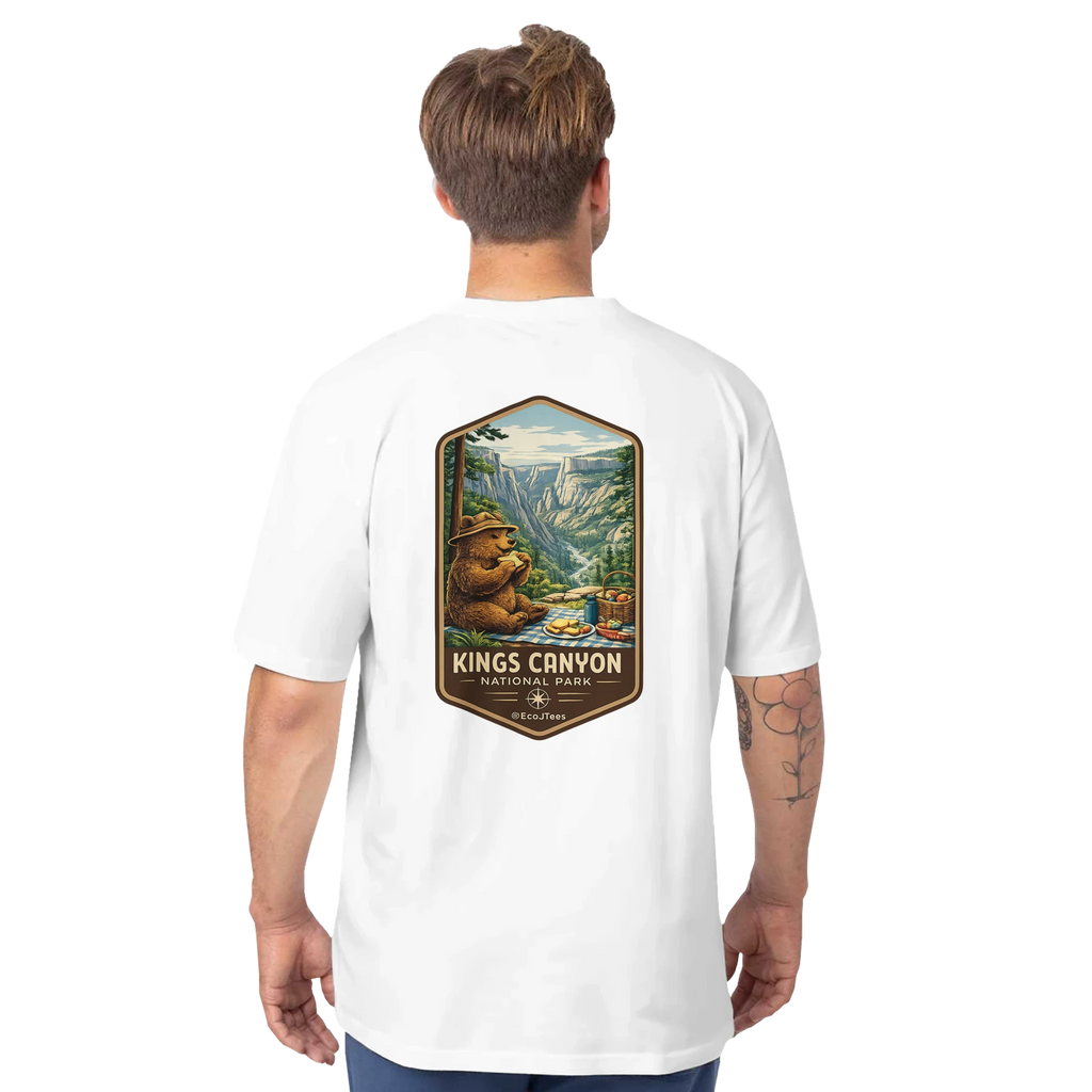 Person wearing a white t-shirt with Kings Canyon National Park graphic on the back