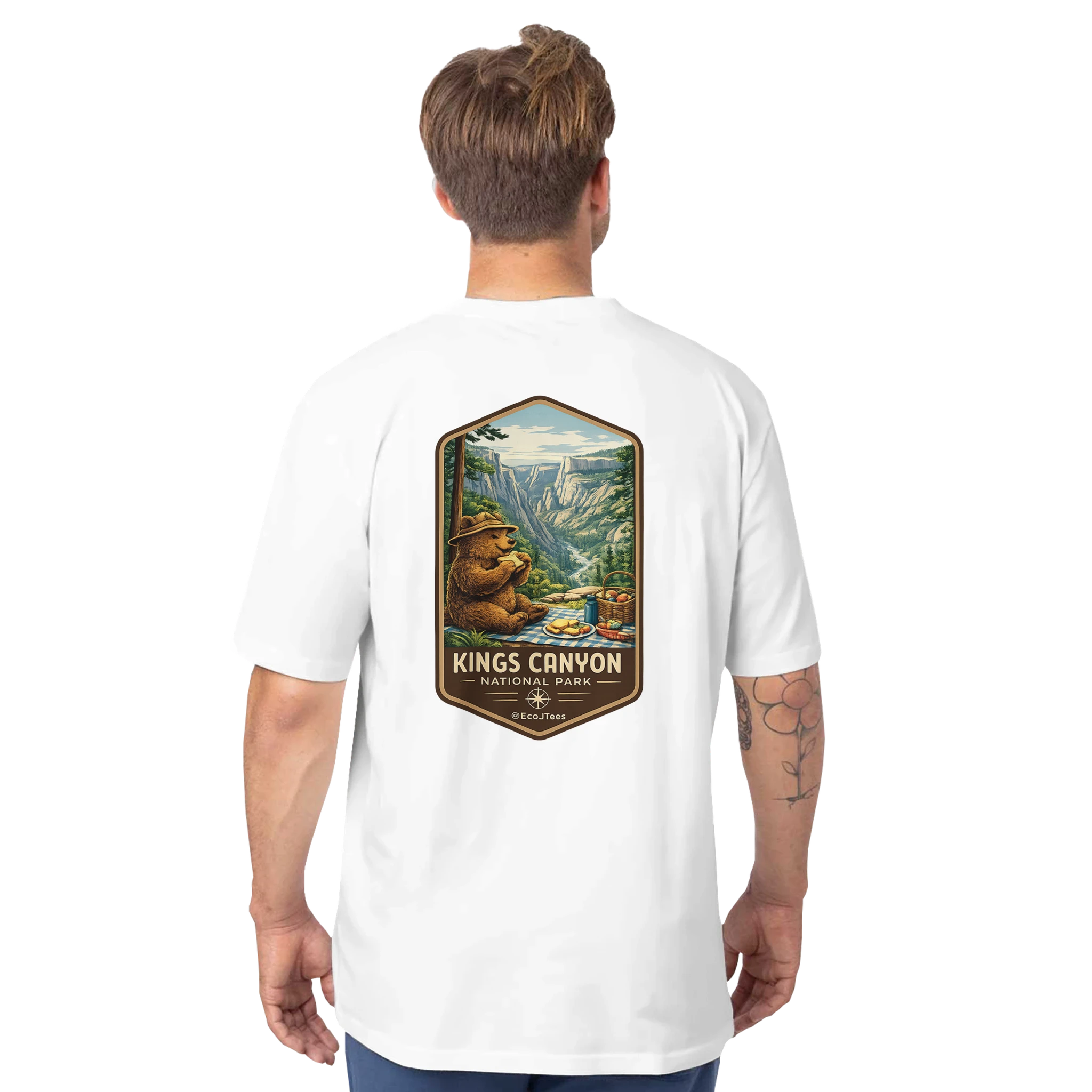 Person wearing a white t-shirt with Kings Canyon National Park graphic on the back