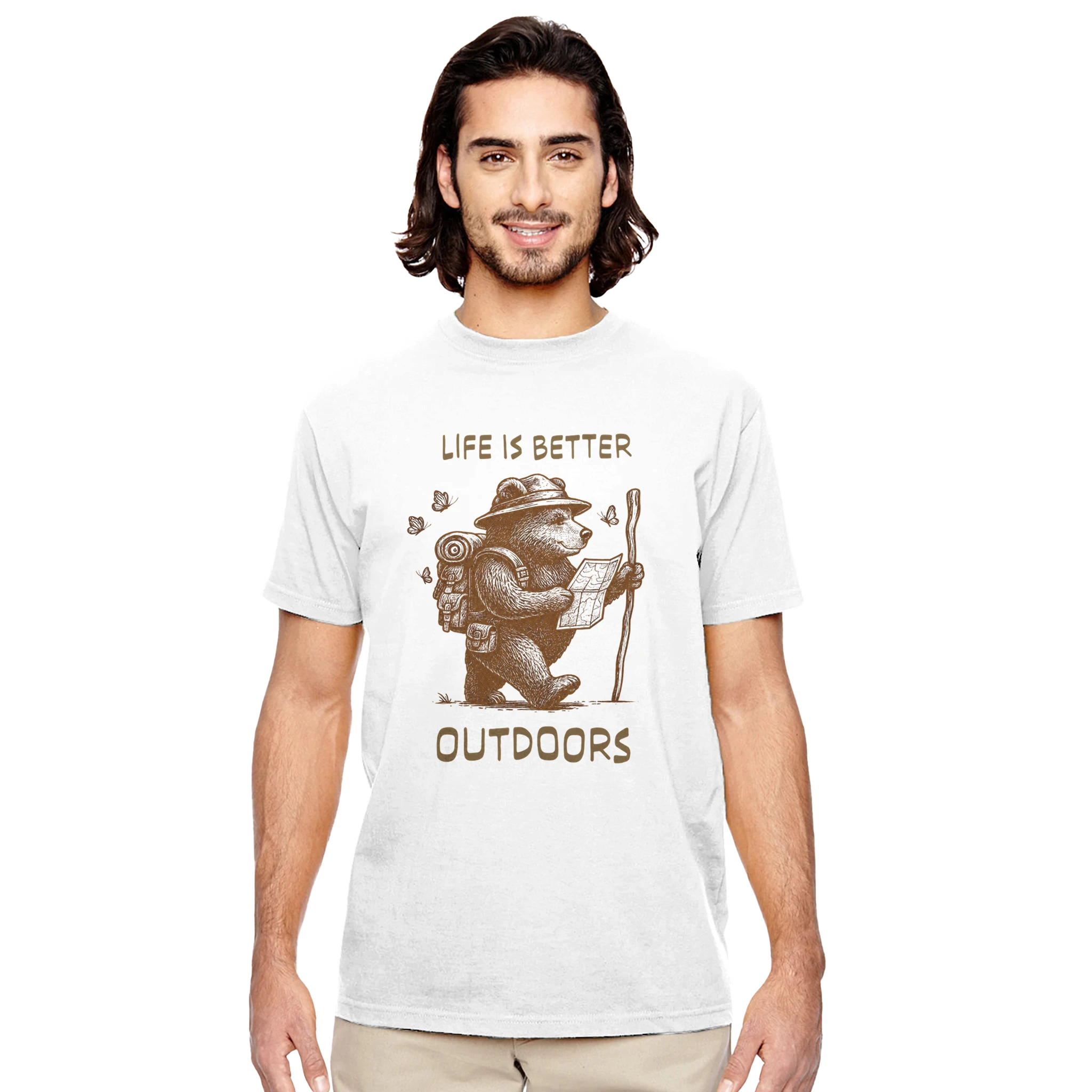 A man wearing a white crewneck t-shirt with a brown graphic of a bear hiker and the text 'LIFE IS BETTER OUTDOORS' on a solid white background.