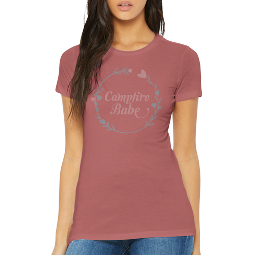 Woman wearing a maroon t-shirt with 'Campfire Babe' text on a white background