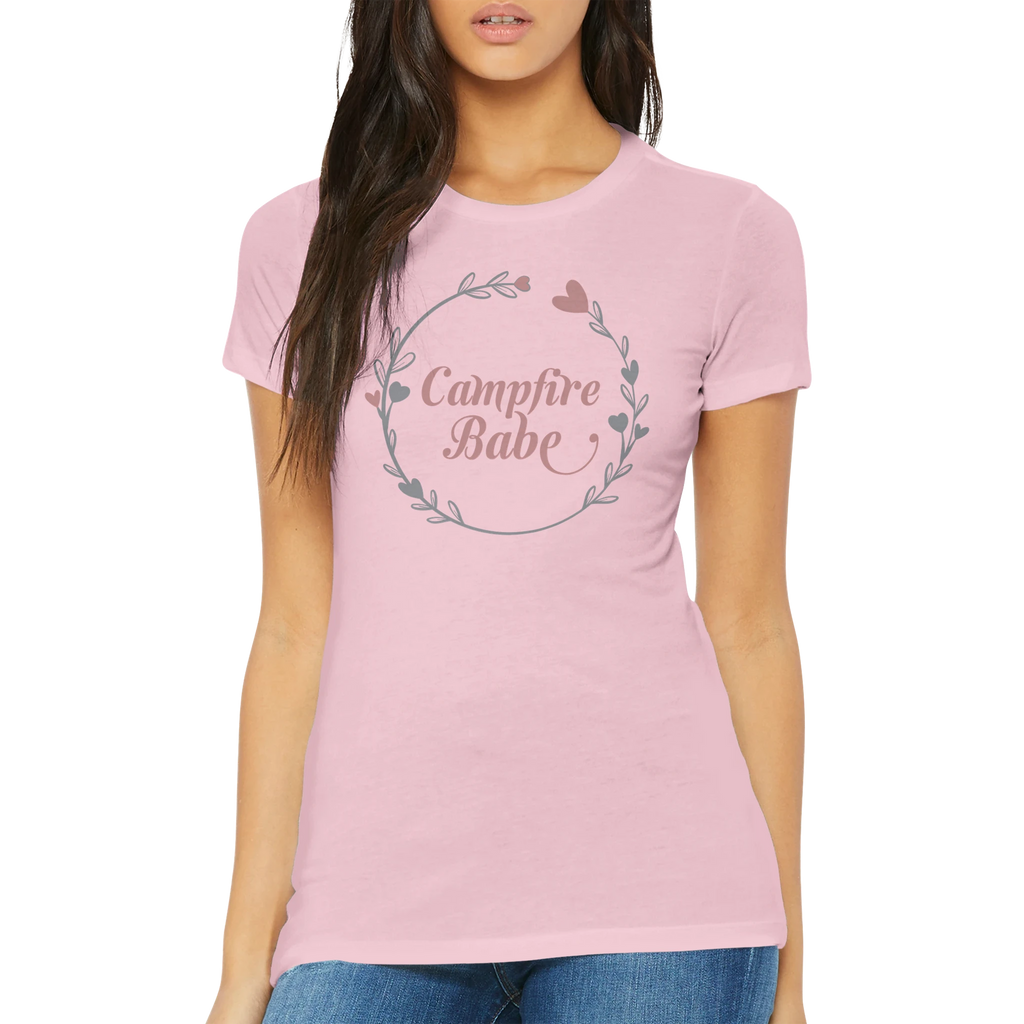 Woman wearing a pink t-shirt with 'Campfire Babe' design on a white background