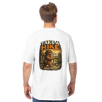 Person wearing a white t-shirt with a bear graphic and 'Take a Hike' text on the back.